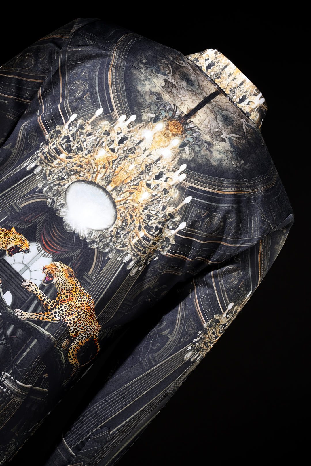 Decorative product with intricate design, including a leopard and celestial elements, on a dark background. LoudLess