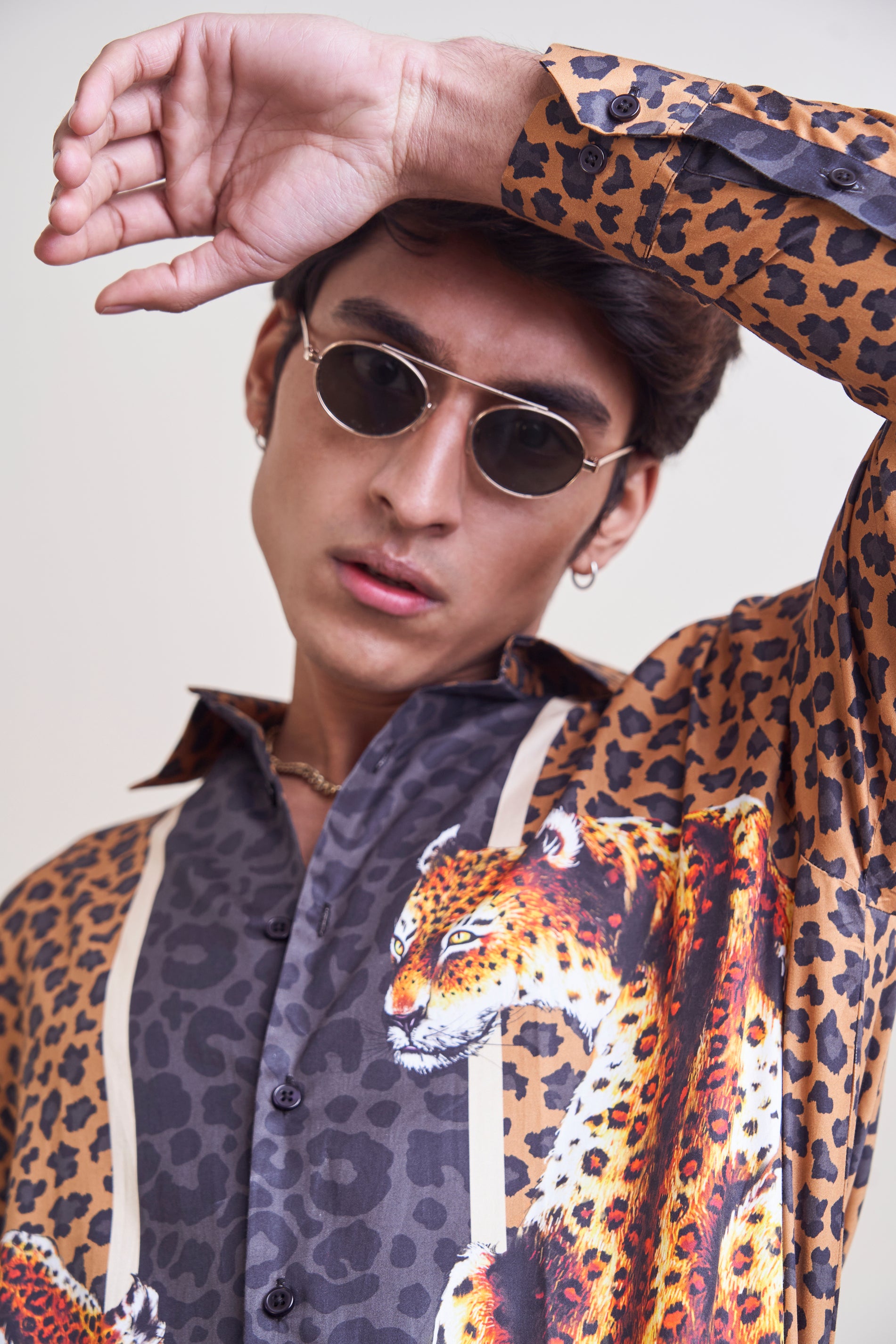 Luxury silk leopard print shirt, handcrafted in India for a sophisticated and bold fashion statement